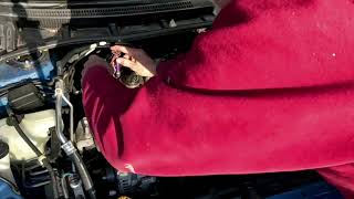 How to replace a charcoal canister on a Toyota Corolla