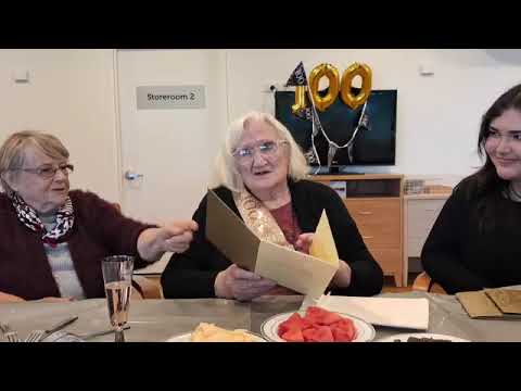 Isabella Ellen Learmonth Davies receiving a 100th birthday card from King Charles