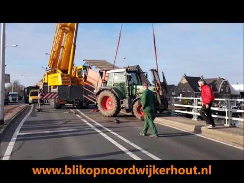 Hijskraan zet tractor rechtop na ongeval op de 's Gravendamseweg Noordwijkerhout