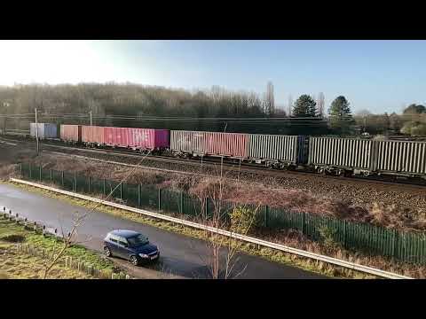 90003 and 90004 lead 4S52 Crewe - Coatbridge. 9th Feb 2023