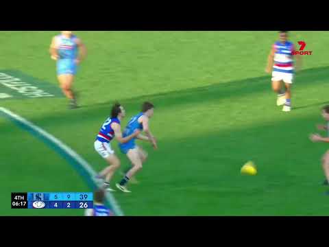 Qualifying Final Hostplus Snapshot - Central's Aiden Grace kicks a long bomb from 48m