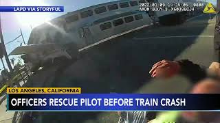 Los Angeles police pull pilot from plane moments before train crash