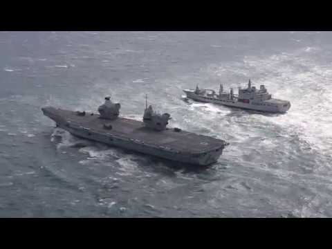 Carrier Queen Elizabeth meets tanker Tidespring