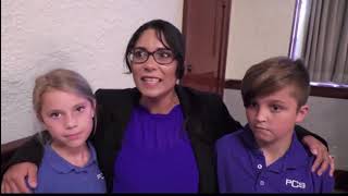 Former PCS cafeteria worker join others in becoming naturalized U.S. citizens