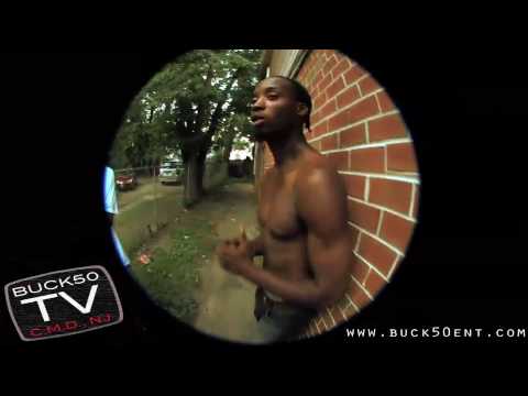 BUCK50ENT - REESE shows his gunshot scars, talks about life in the hood