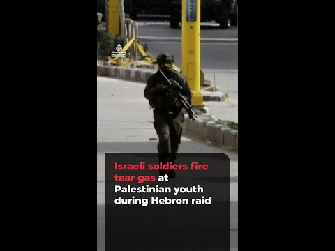 Israeli soldiers fire tear gas at Palestinian youth during raid in Hebron | AJ#shorts