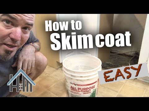 How to skim coat, apply drywall mud and fix walls. Easy!