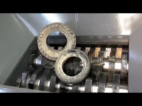 Modern crushers destroy giant car tires | mass destruction machine.
