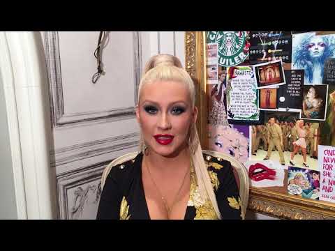 Christina Aguilera receives an award for her work with helping domestic violence victims