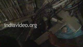 Rolling Silk thread in Sualkuchi, Assam