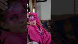 Sister reveals her painted face to her baby brother, his reaction is priceless