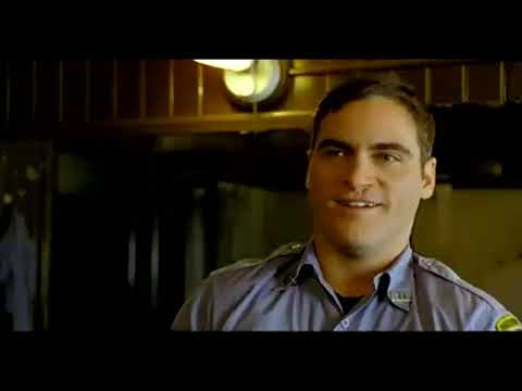 Trailer still: honor guard and bagpipes outside the station as a solemn cue begins