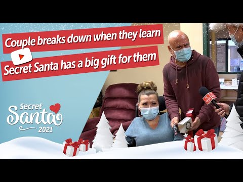 Couple breaks down when they learn a Secret Santa has a big gift for them