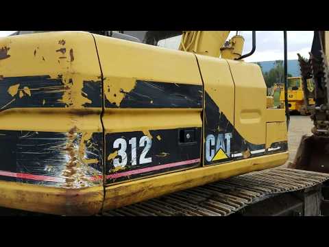 YouTube video about: How much does a 312 cat excavator weight?