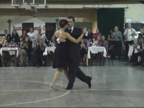  Paola Tacchetti  and  Alejandro Hermida  are  dancing  to  the  tango  "  Tristeza Marina  "