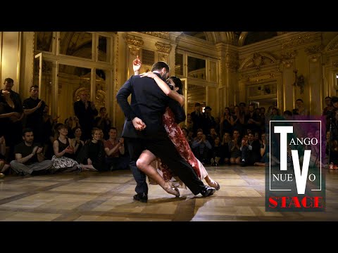  Lorena Tarantino  and  Gianpiero Galdi  are  dancing  to  the  tango  "  Con todo mi corazon  "  by  Juan D'Arienzo  at  Krakus Aires Tango Festival  in  2019