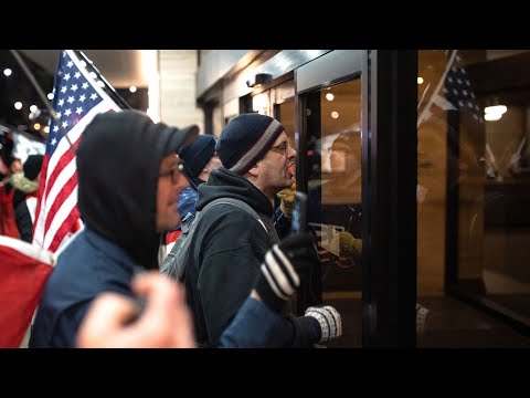 Justin Trudeau swarmed by group of 'angry' protesters as he walked into Hamilton restaurant