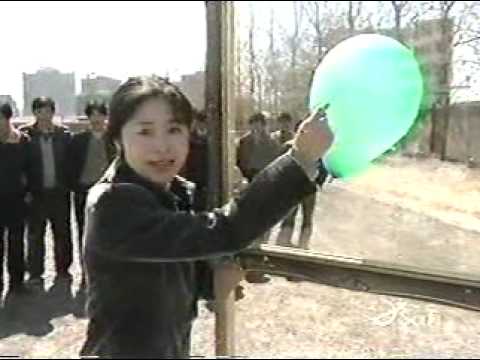 man throwing needle through glass ripleys