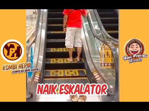 kombi-heppiii-naik-eskalator