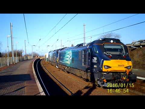 DRS 88005 "Minerva" & 88001 "Revolution" pass Newton-on-Ayr on a sunny afternoon.