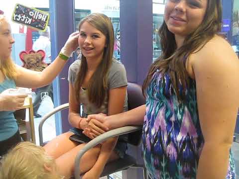 Kaitlyn getting ear pierced
