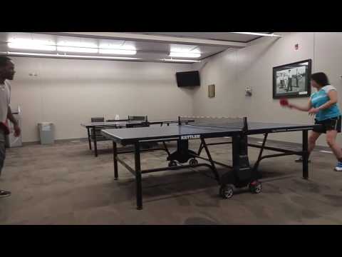 Sarah is playing ping pong