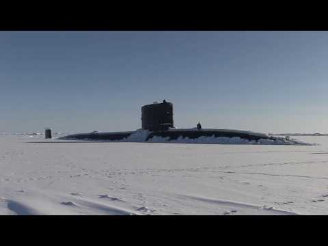 Royal Navy Submarine HMS Trenchant Surfaces in Arctic Ocean