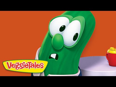 Larry the cucumber from VeggieTales with an orange backdrop and VeggieTales logo in the corner