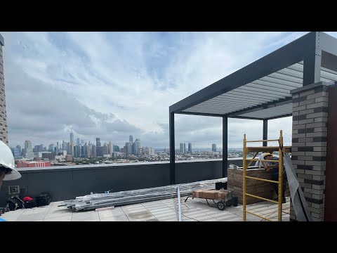 Commercial rooftop louvered roof Jersey City NYC skyline thumbnail