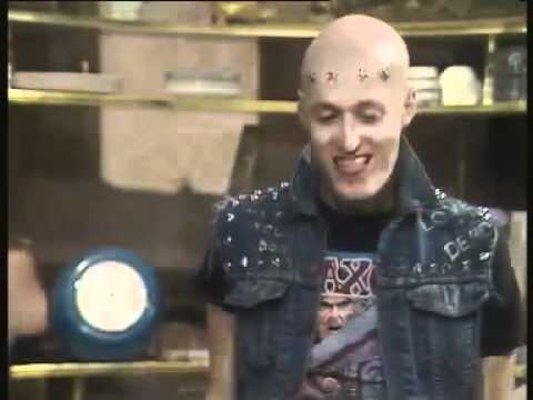 young ones Vyvyan doing press ups / push ups