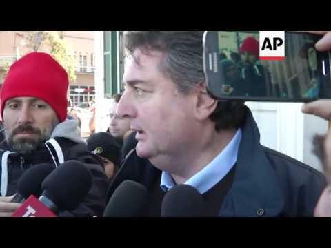 Charred Greek ferry towed into port of Brindisi