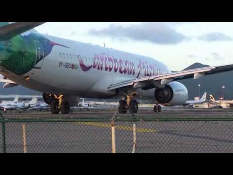 Beware of jet blast! Maho Airport Beach, Saint Maarten.