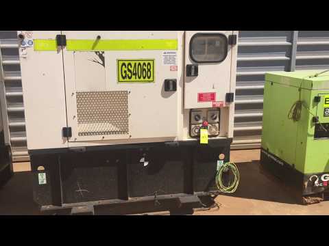 AE053 - 2012 Olympian Model XQE20-2 20KVA Silenced Enclosed Skid Mounted Generator (GS4068 / E16)
