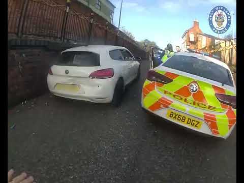 This is the moment a prolific criminal rammed police vehicles as he tried to get away from officers