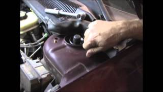 Replacing Strut Assembly on a 2000 Pontiac Bonneville. It has a broken coil spring.