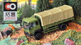 Xcartoys FAW truck with figures and working suspension. 1/64 scale Diecast model. 