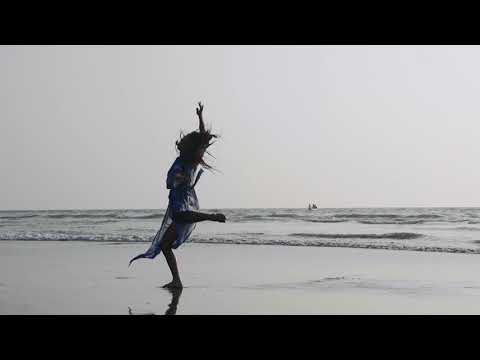 Woman Dancing on the Beach in Slow Motion - no copyright