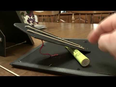 How to Fix a Picture Frame From Falling Over