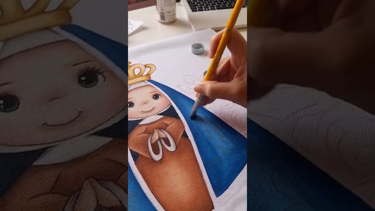 Demostração de como pintar o mato do desenho de nossa Senhora de Aparecida.