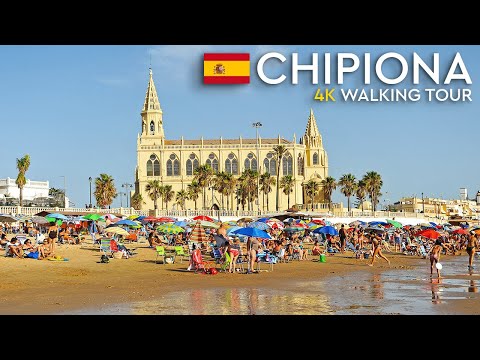 Chipiona, Spain. Wide beaches and a church almost on the sand. Walking tour in 4k.