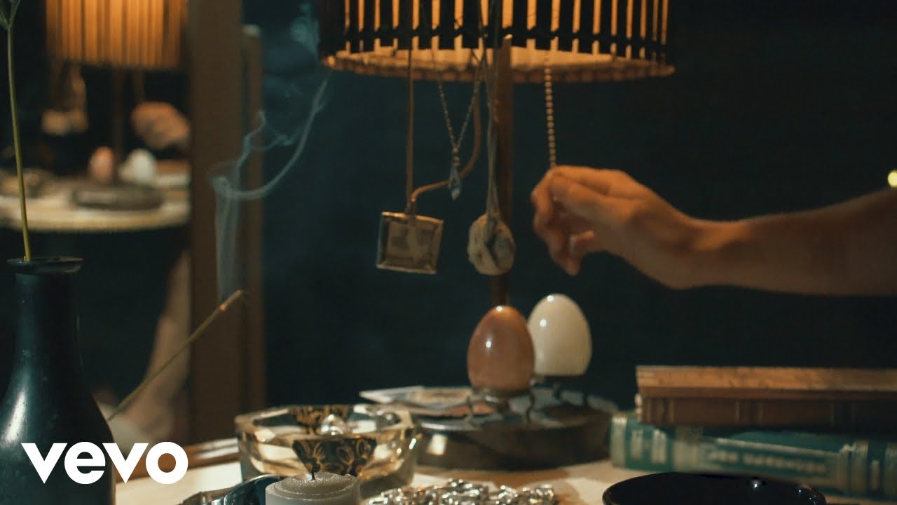 La Mitad Lyrics English Translation