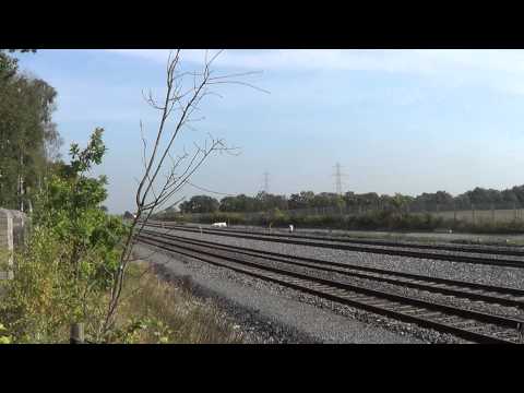 Irish Rail 201 loco 217 + mk4 set 4008 passes Stacumny Bridge