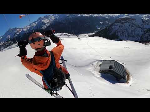 Long flight by kite at the Cufercalhut in Switzerland / a nice snowkite day
