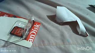 unboxing SanDisk 32GB SD card