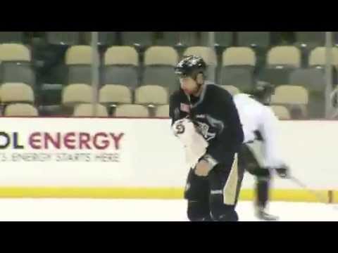 Evgeni Malkin and Craig Adams fight at practice