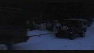 Discovery Towing Series Up Steep Snowy Hill