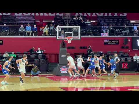 Alex Konov challenges the shot, grabs the rebound and hits the three