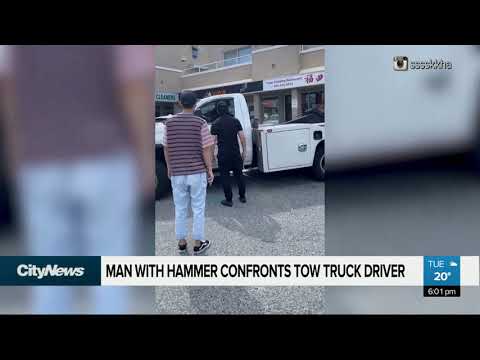 Man confronts tow truck driver with hammer