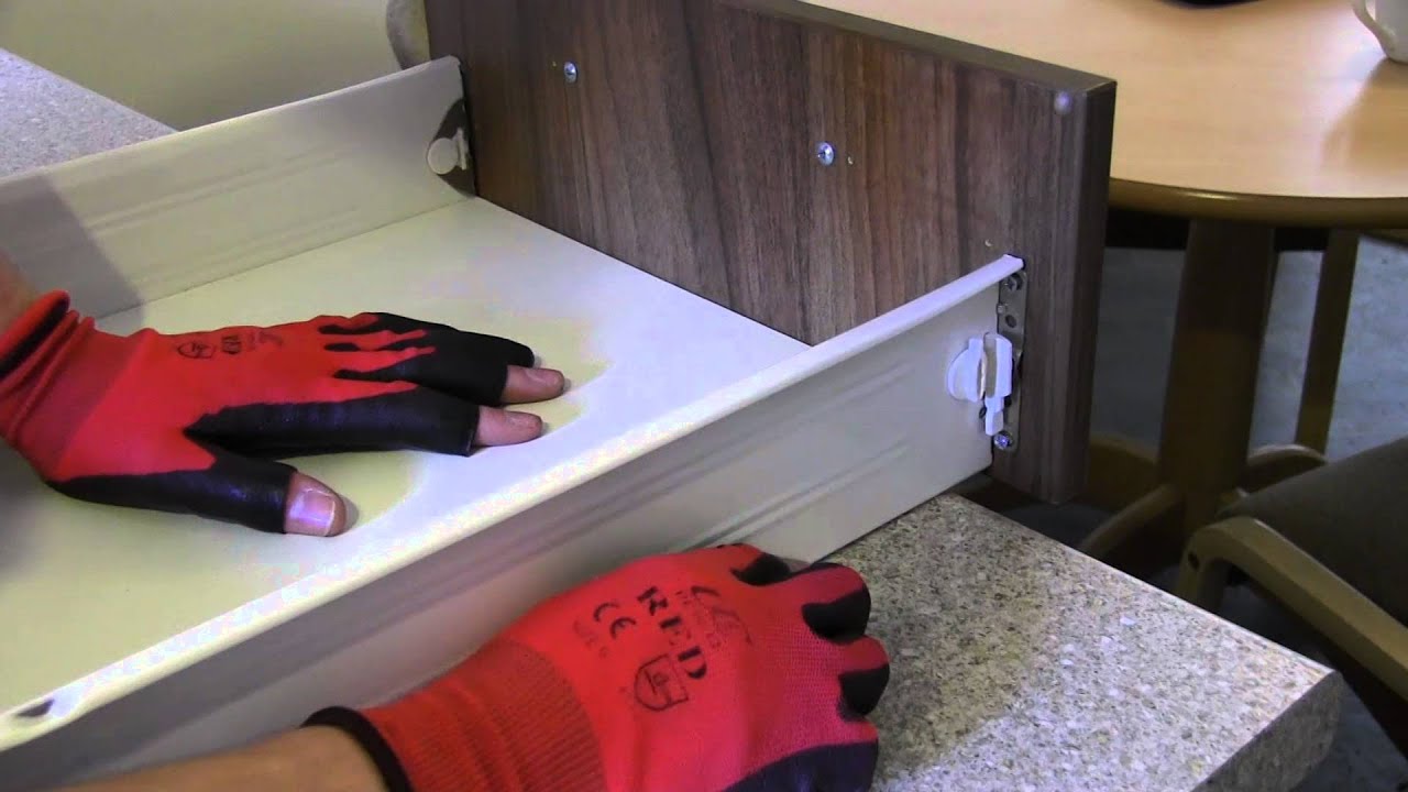 How to re-attach a kitchen drawer front