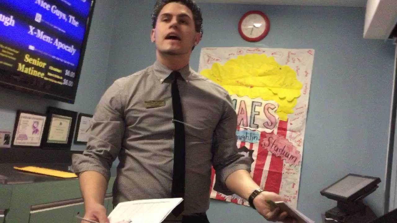 Caught on tape. Crazy asst. manager argues about ticket stub